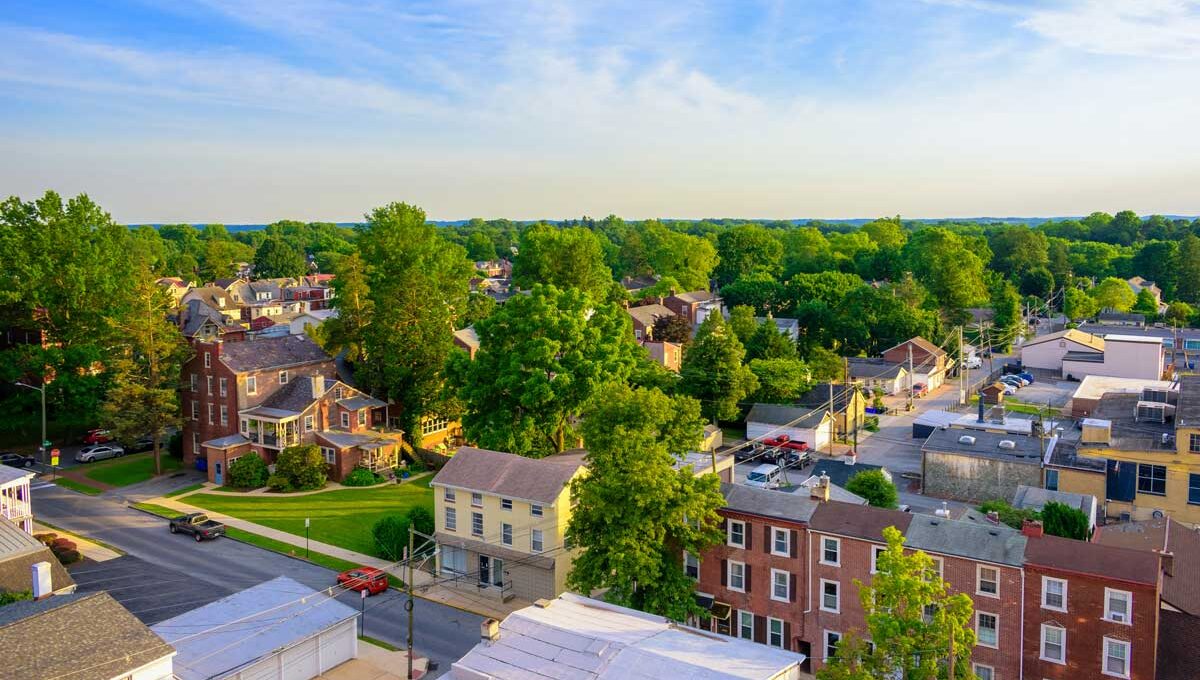 aerial view of homes surrounded by trees in chester county